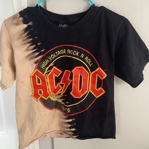 A mixed tan/beige and black ACDC tee